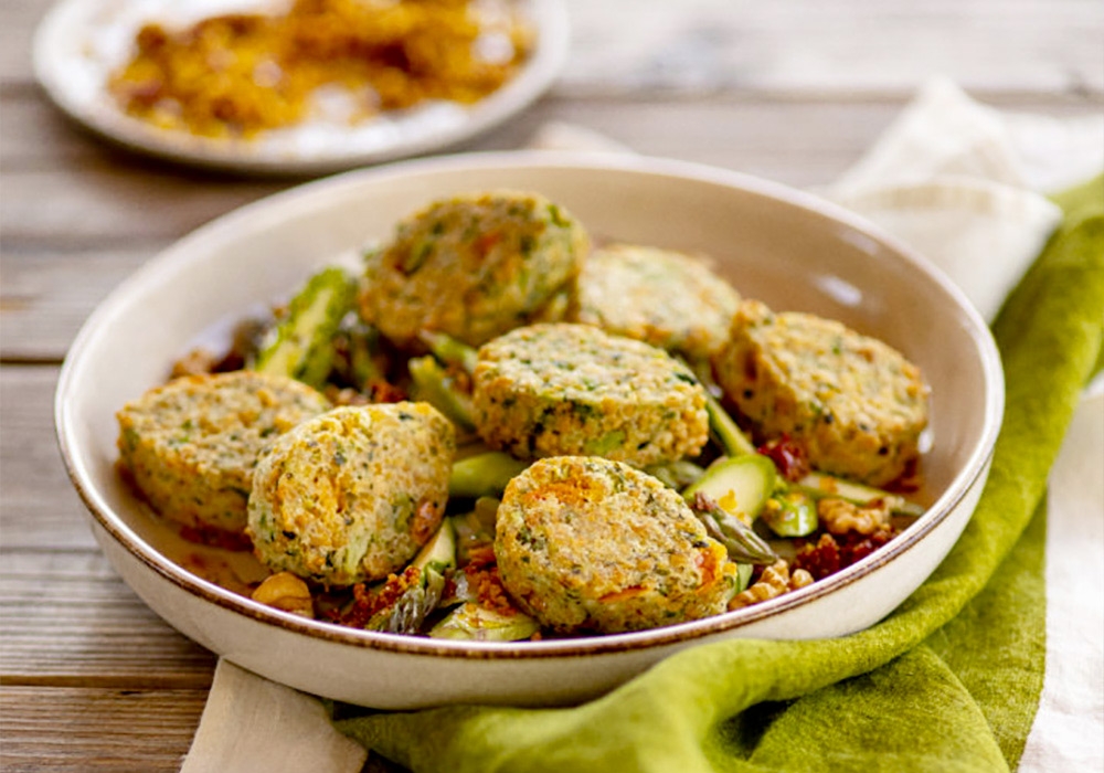 Spelt, tomato and asparagus veggie drops with crunchy walnut asparagus salad and sundried tomatoes